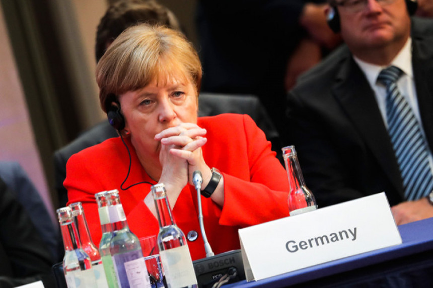 ДW: Њемачка коалиција опстала